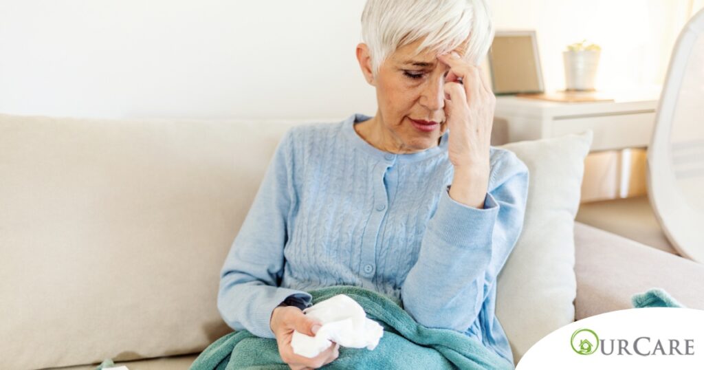 An older sick woman represents what family caregivers want to avoid, especially during flu season.