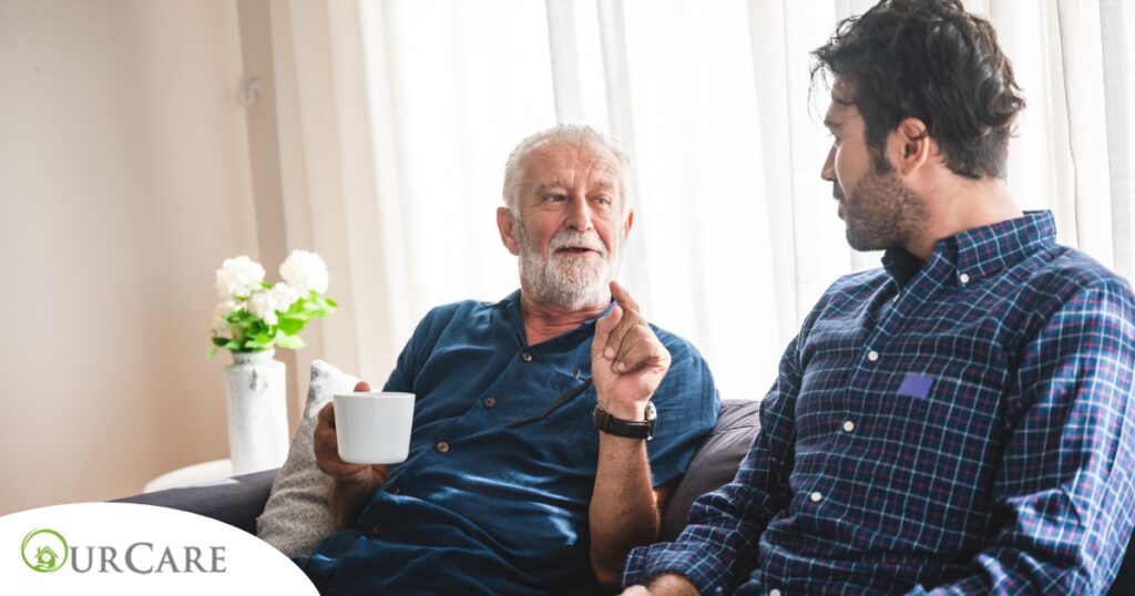 A son talks with an older parent representing the kind of communication needed to tell how aging parents are doing.