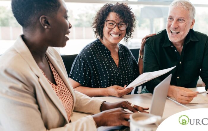 A couple talks with and advisor, representing the type of preparation that is crucial for successful senior care planning.