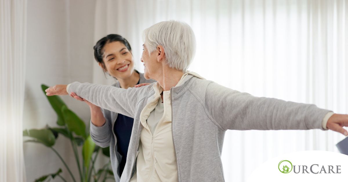 A caregiver and senior practice tai chi as one of many enriching activities for seniors at home.