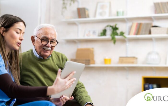 Home caregiver assisting senior man to use telehealth and senior care